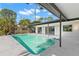 Inviting swimming pool with large patio and modern design at 5215 Dover Ne St, St Petersburg, FL 33703