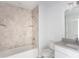 Clean bathroom with bathtub, shower, and modern vanity at 573 Rose Apple Cir, Port Charlotte, FL 33954