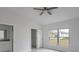 Simple bedroom with large window and walk-in closet at 573 Rose Apple Cir, Port Charlotte, FL 33954
