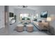 Comfortable living room with sectional sofa and large window at 573 Rose Apple Cir, Port Charlotte, FL 33954