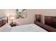 Bedroom with double bed, nightstands, and dresser at 6320 Cliveden Ct, Apollo Beach, FL 33572