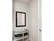 Entryway with glass-top table and mirror at 6320 Cliveden Ct, Apollo Beach, FL 33572