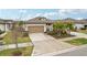 Single-Gathering home with attached garage and landscaping at 6320 Cliveden Ct, Apollo Beach, FL 33572