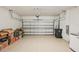 Garage with storage space and an overhead door at 6320 Cliveden Ct, Apollo Beach, FL 33572