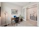 Home office with desk, chair, and French doors at 6320 Cliveden Ct, Apollo Beach, FL 33572