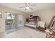 Bedroom with bunk beds and sliding glass door to patio at 804 67Th W St, Bradenton, FL 34209