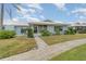 Cute condo with a screened porch and walkway at 804 67Th W St, Bradenton, FL 34209