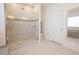 Large bathroom with walk-in shower and tile flooring at 8203 Abalone Loop, Parrish, FL 34219