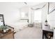Spacious bedroom featuring a queen-size bed and a built-in workspace at 8203 Abalone Loop, Parrish, FL 34219