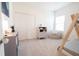 Bright bedroom with ample closet space and a comfortable sitting area at 8203 Abalone Loop, Parrish, FL 34219