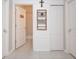 Clean hallway with extra storage and access to bathroom at 8203 Abalone Loop, Parrish, FL 34219