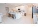 Open concept kitchen with an island and stainless steel appliances at 8203 Abalone Loop, Parrish, FL 34219
