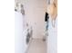 Clean laundry room with washer, dryer, and extra storage at 8203 Abalone Loop, Parrish, FL 34219
