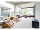 Relaxing screened porch with comfy seating and a view of the backyard at 8203 Abalone Loop, Parrish, FL 34219