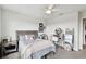 Cozy bedroom featuring a double bed and a vanity area at 8368 Greenway Ave, Wesley Chapel, FL 33544