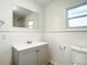 Clean bathroom design featuring new vanity, updated mirror and stylish, modern fixtures at 979 11Th S Ave, St Petersburg, FL 33705