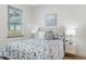 Cozy bedroom with a large window and a comfortable bed at 979 11Th S Ave, St Petersburg, FL 33705