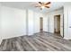 Large bedroom showcasing wood-look flooring and ample closet space at 979 11Th S Ave, St Petersburg, FL 33705