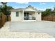 Charming front exterior with ample parking and quaint front porch at 979 11Th S Ave, St Petersburg, FL 33705