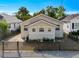 Charming single story home with neutral paint, rock facade and wood fence at 979 11Th S Ave, St Petersburg, FL 33705