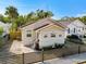 Charming single story home with neutral paint, rock facade, and manicured landscaping at 979 11Th S Ave, St Petersburg, FL 33705
