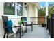 Cozy front porch with seating area, perfect for relaxing outdoors at 979 11Th S Ave, St Petersburg, FL 33705