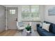 Inviting living area featuring a comfortable seating arrangement and natural light at 979 11Th S Ave, St Petersburg, FL 33705