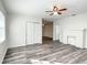 Open living area with wood-look floors and a white brick fireplace at 979 11Th S Ave, St Petersburg, FL 33705