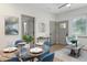 Open concept living space with kitchen, dining area, and comfortable seating at 979 11Th S Ave, St Petersburg, FL 33705