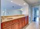Kitchen with granite countertop and wood cabinets at 10 Aster Pl, Oldsmar, FL 34677