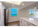 Modern kitchen with white cabinets and ocean view at 100 Oakmont Ln # 309, Belleair, FL 33756
