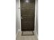 Entryway with dark brown door and light flooring at 1001 S Bayshore Blvd # 205, Safety Harbor, FL 34695
