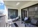 Relaxing balcony with outdoor furniture and ocean view at 12924 Gulf Blvd # 307, Madeira Beach, FL 33708