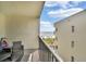 Balcony with ocean view and seating for two at 12924 Gulf Blvd # 307, Madeira Beach, FL 33708