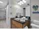 Clean bathroom with granite countertop and updated fixtures at 12924 Gulf Blvd # 307, Madeira Beach, FL 33708