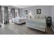 Spacious bedroom with two double beds and large windows at 12924 Gulf Blvd # 307, Madeira Beach, FL 33708