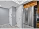 Entryway with tile floor and access to kitchen at 12924 Gulf Blvd # 307, Madeira Beach, FL 33708