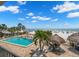 Inviting pool area with beach access and ample seating at 12924 Gulf Blvd # 307, Madeira Beach, FL 33708