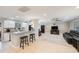 Kitchen with granite countertops and white cabinets at 13441 Del Prado S Dr, Largo, FL 33774