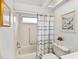 Clean bathroom with shower/tub combo and neutral decor at 1559 Glengarry Dr, Palm Harbor, FL 34684