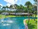 Highland Lakes community entrance with pond and fountain at 1559 Glengarry Dr, Palm Harbor, FL 34684