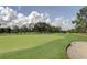 Picturesque golf course with lush greens at 1559 Glengarry Dr, Palm Harbor, FL 34684