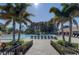 Relaxing resort-style pool with lounge chairs at 1559 Glengarry Dr, Palm Harbor, FL 34684