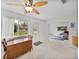 Sunroom features a table, access to backyard, and large windows at 1559 Glengarry Dr, Palm Harbor, FL 34684