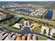 Aerial view of a beautiful home on a quiet street in a luxury community at 15614 Aurora Lake Cir, Wimauma, FL 33598