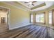Spacious bedroom with large windows and ceiling fan at 16122 Cedar Key Dr, Wimauma, FL 33598