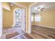 Spacious foyer with views to the living area and front entry at 16122 Cedar Key Dr, Wimauma, FL 33598