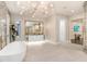 Spa-like bathroom featuring a soaking tub and modern vanity at 16220 Villarreal De Avila, Tampa, FL 33613