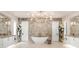 Elegant bathroom with freestanding tub, dual vanities, and marble accents at 16220 Villarreal De Avila, Tampa, FL 33613
