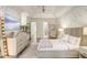 Elegant bedroom featuring a comfy bed and vanity area at 16220 Villarreal De Avila, Tampa, FL 33613